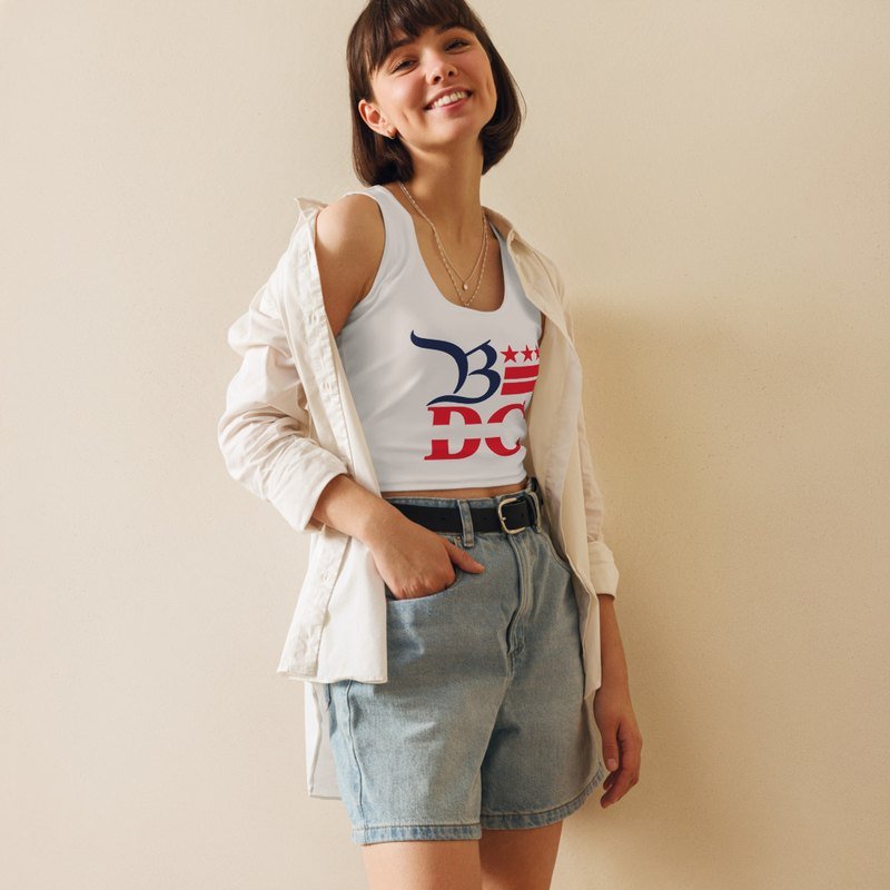 White B★DC crop top with the flag-striped mark